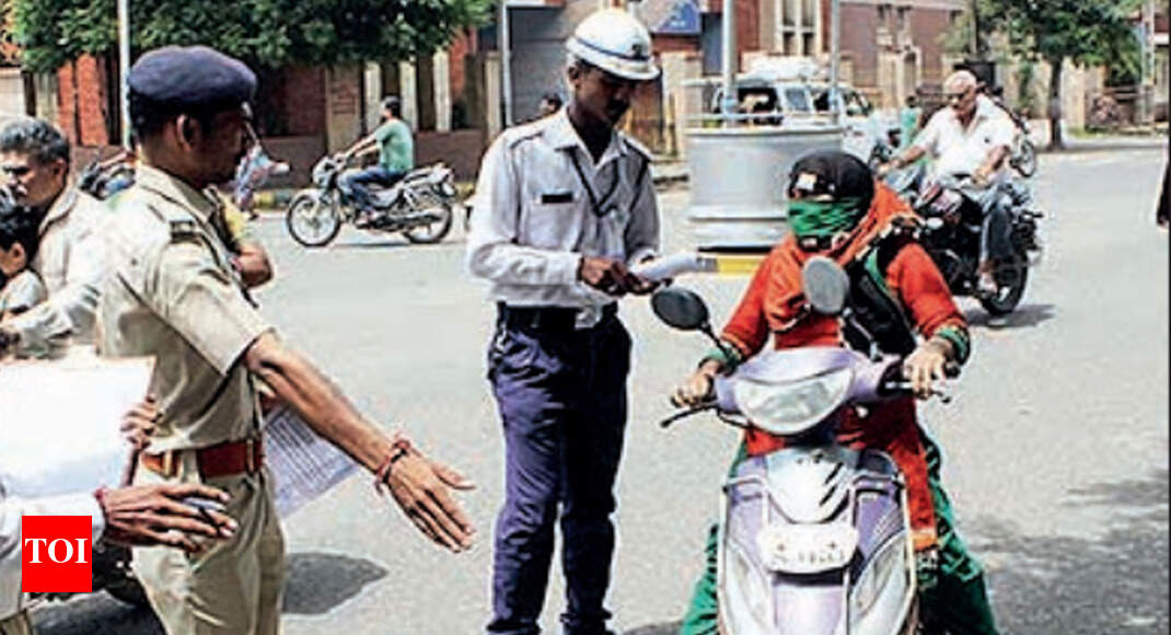 Rajkot Citizens group threatens to break helmet rules Rajkot News