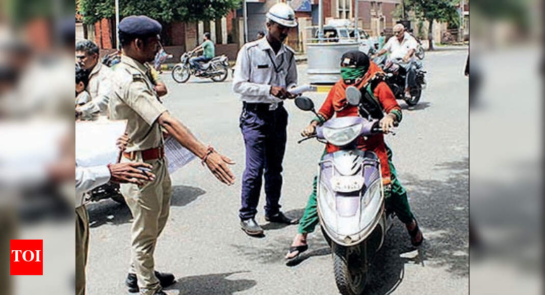 Rajkot Citizens group threatens to break helmet rules Rajkot News