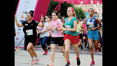 Painting the town pink: Delhi women run to promote physical wellness