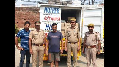 Noida: Cops stop ‘dairy’ truck on EPE, find liquor cartons in it