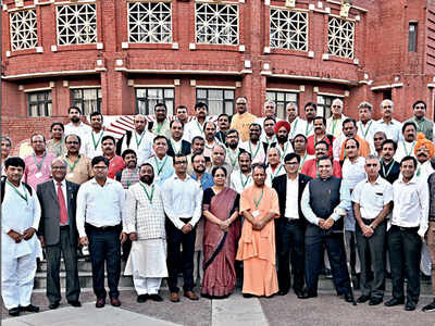 Uttar Pradesh chief minister Yogi Adityanath with his cabinet colleagues after the leadership development programme ‘Manthan-1’ at IIM Lucknow on Sunday