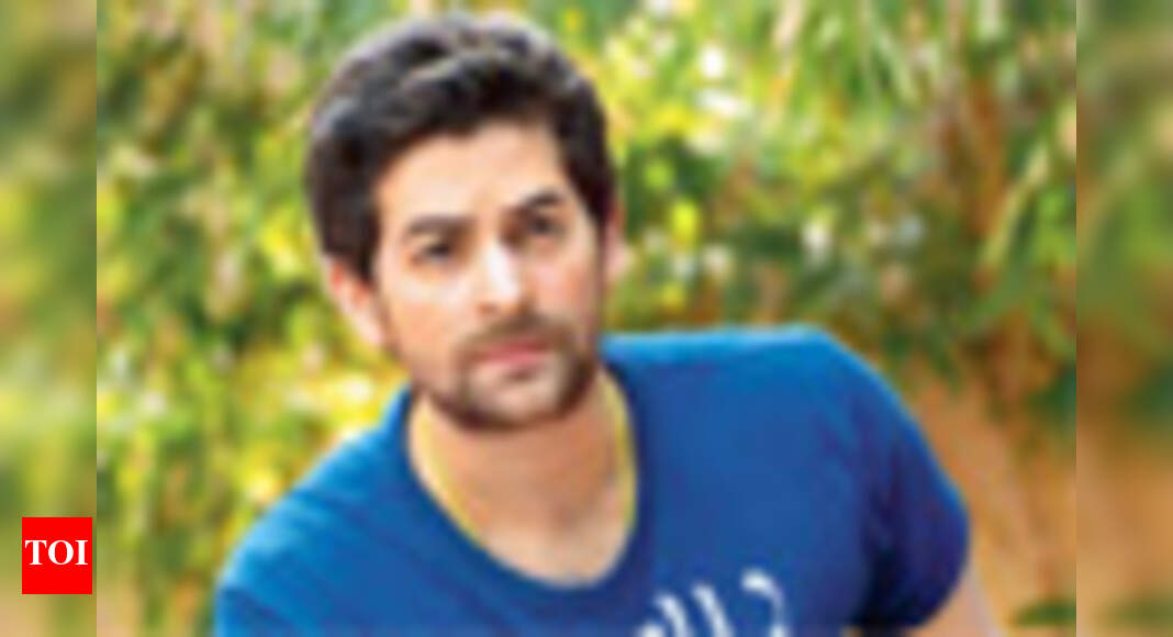 Neil auctions his pictures for tigers! | Hindi Movie News - Times of India