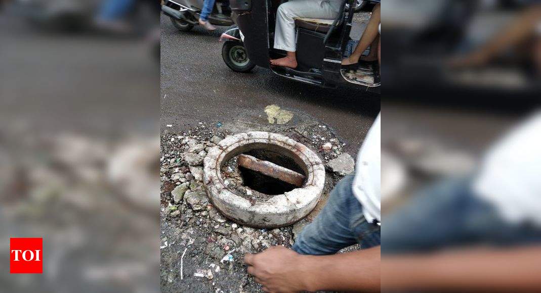 Open Manhole - Times of India