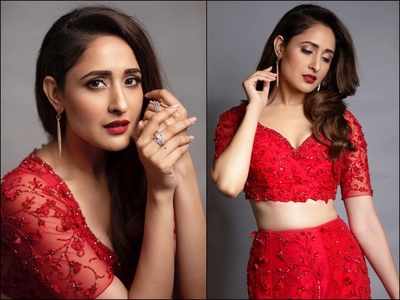 Gorgeous Alert! Pragya Jaiswal’s latest poses in a red lehenga will make you swoon!
