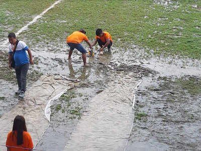 Rain, slushy ground torment women footballers at Nationals