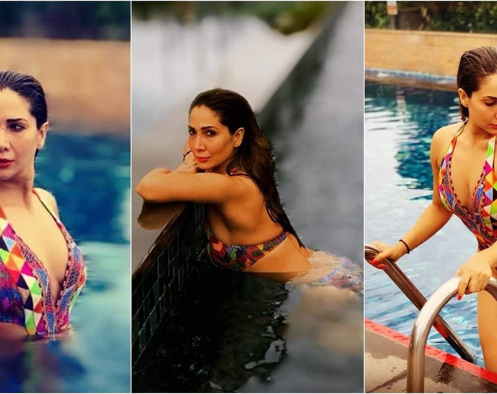 
Bikini pictures of Kim Sharma in a pool are turning up the heat in cyberspace

