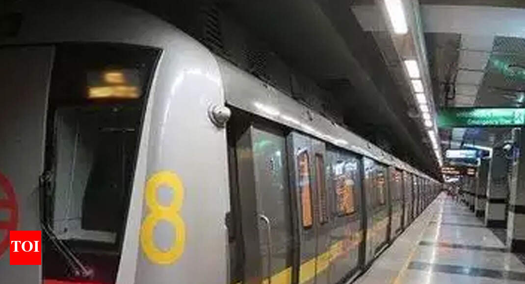 Woman jumps in front of Delhi Metro train Delhi News Times of India