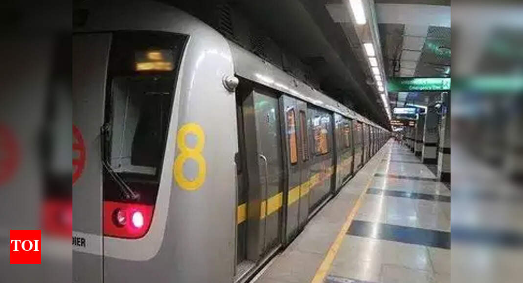 Woman jumps in front of Delhi Metro train Delhi News Times of India