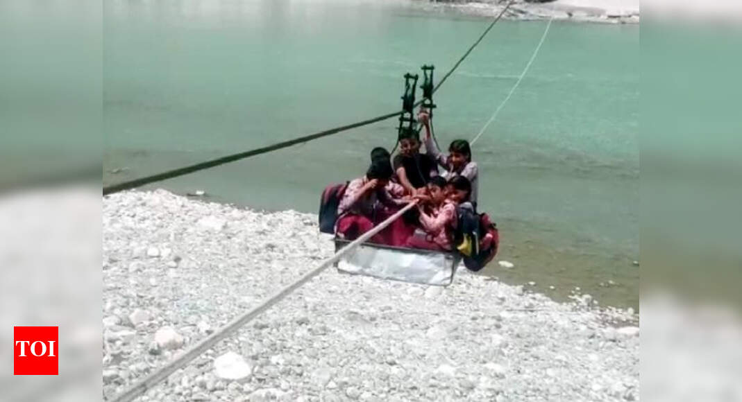 Trolley ropeway across river on border with Himachal tottering