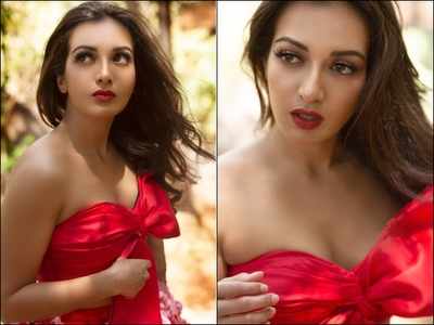 Hotness Alert! Catherine Tresa flaunts her incredible figure and oozes oomph in a red fluffy gown