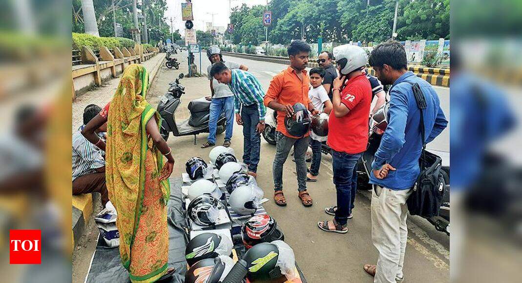 Show proof of epurchase or buy helmet now to avoid fine! Rajkot News