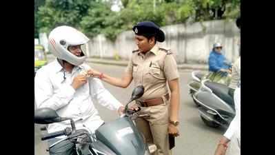 Traffic police thank law abiders, plan to gift them helmets, wristbands
