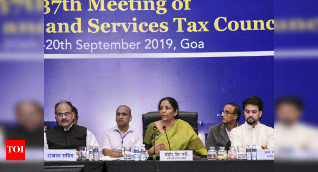 GST Council cuts tax rate on hotel room tariffs Times of India