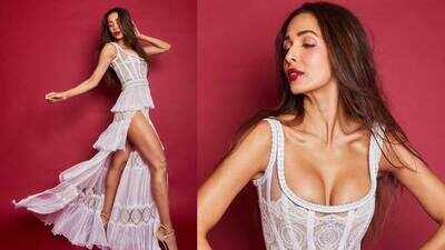 Malaika Arora amp up the glam quotient in white maxi gown, beau Arjun Kapoor couldn't stop himself from dropping a compliment