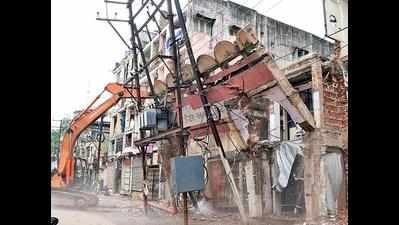 Civic body tears down 30 houses, shops in Gorakund