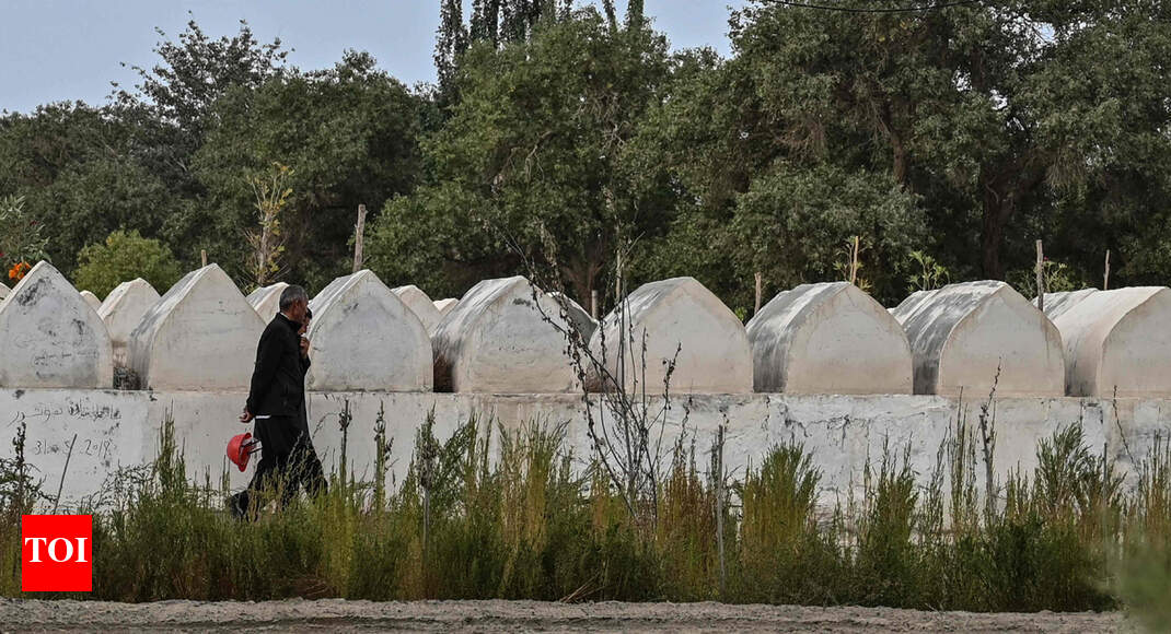 Even in death, Uighur Muslims feel long reach of Chinese state