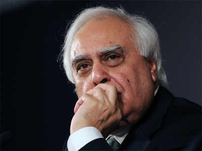 PM should attend to work, have less photo ops: Kapil Sibal