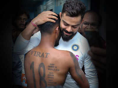 M S Dhoni Fan,ಕೊಪ್ಪಳದ ಅಭಿಮಾನಿ ಬೆನ್ನ ಮೇಲೆ ಅರಳಿದ ಮಿಸ್ಟರ್‌ ಕೂಲ್‌ ಧೋನಿ! -  koppal: m s dhoni big portrait tattoo - Vijay Karnataka