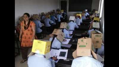 Karnataka: College students made to wear cardboard boxes at exam