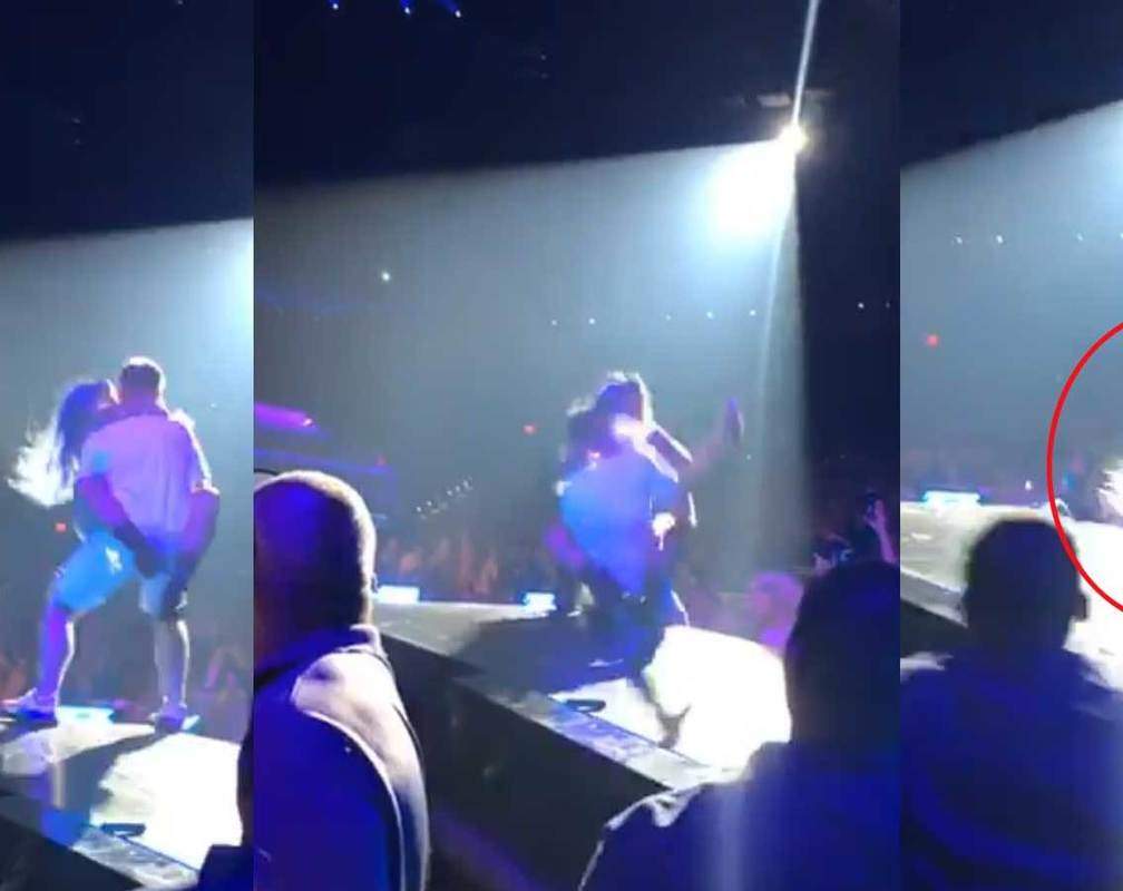 
Lady Gaga falls off stage with a fan mid concert in Las Vegas
