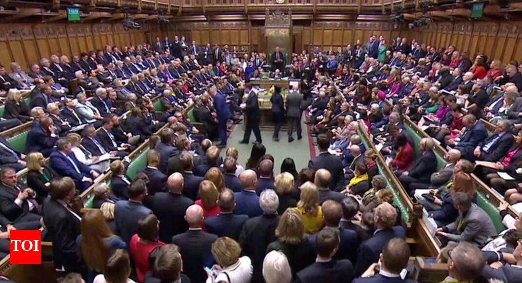 British MPs vote to delay Brexit deal decision