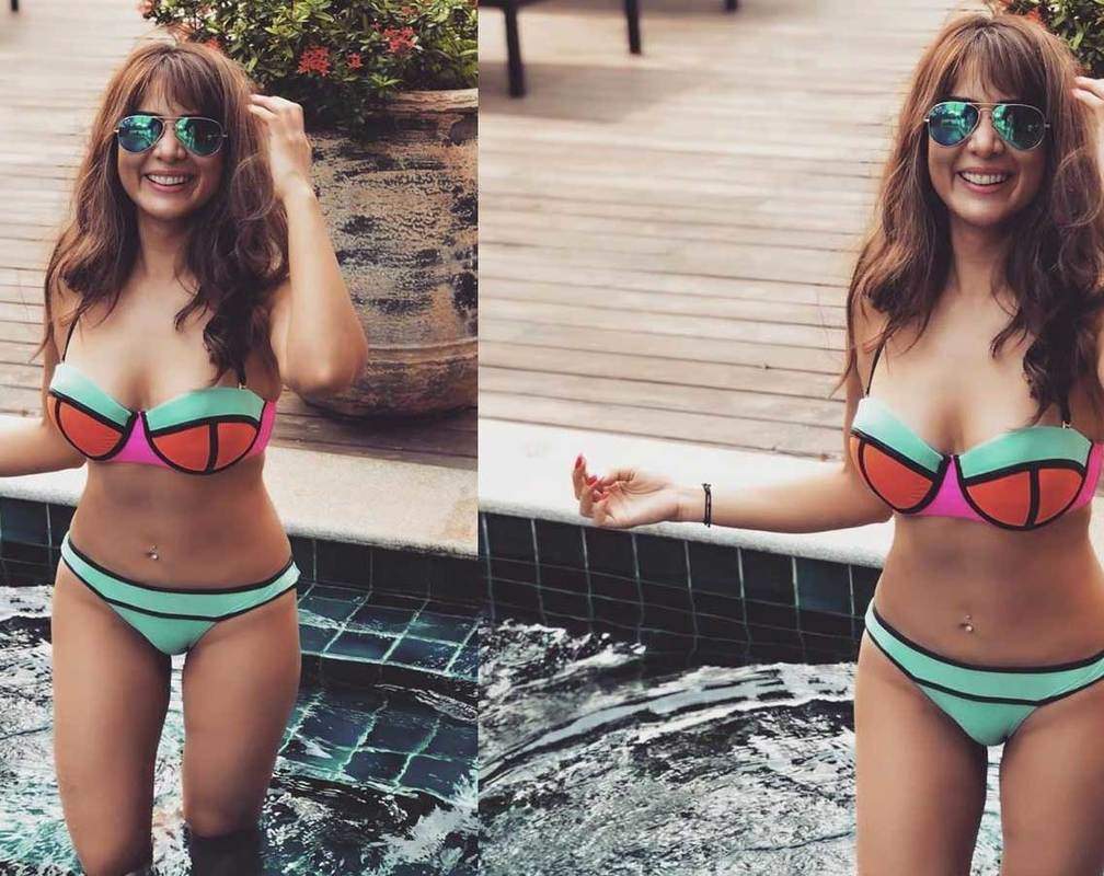 
Kim Sharma's latest picture in multi coloured neon bikini is setting the internet on fire
