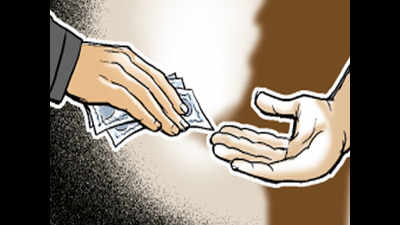 Sales tax employees held for taking bribe