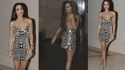 Malaika Arora flaunts toned body in a metallic short dress and plunging neckline