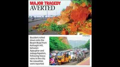 Landslide on Beach Road, boulders from Kailasagiri stall traffic flow