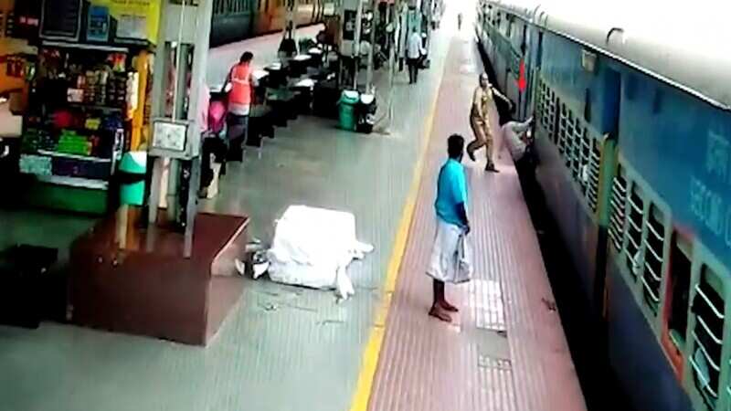 Watch: RPF staff rescues passenger hanging off moving train in Coimbatore