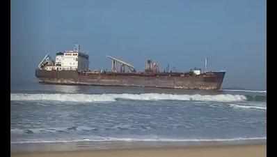 Drifting dredger brought to shore by port authorities