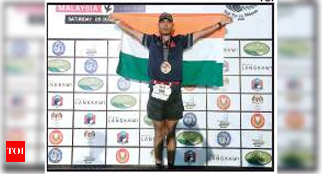 fastest triathlon time