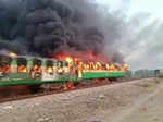 Shocking pictures of massive fire on moving train in Pakistan