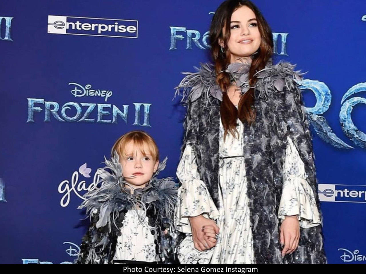 Selena Gomez plays the perfect big sister to Gracie Teefey as they twin at  'Frozen 2' premiere