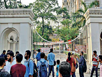 Students outside the main gate on Tuesday