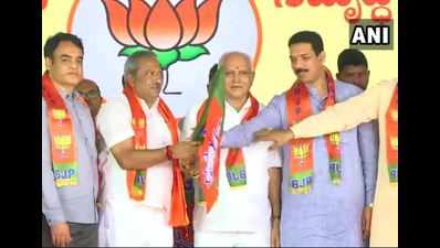 16 disqualified Karnataka MLAs join BJP
