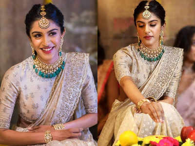 This bride ditched the red lehenga for an elegant beige sari and blouse on her engagement