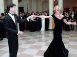Princess Diana's iconic blue velvet evening gown that she wore to dance with Travolta is now up for auction