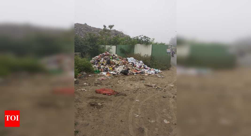 garbage-heap-next-to-the-society-wakad-times-of-india