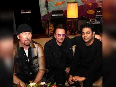 A R Rahman poses with Irish rock band U2 members Bono and The Edge