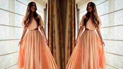 Ileana D'Cruz looks casually chic in this peach dress as she treats fans with her perfect smile