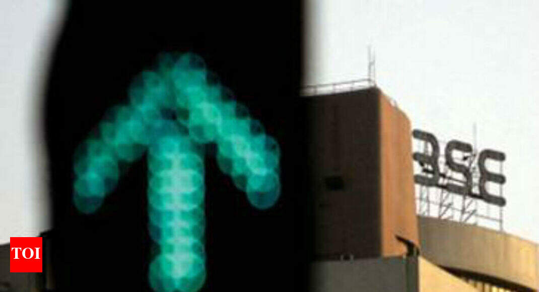 Sensex, Nifty close at record highs