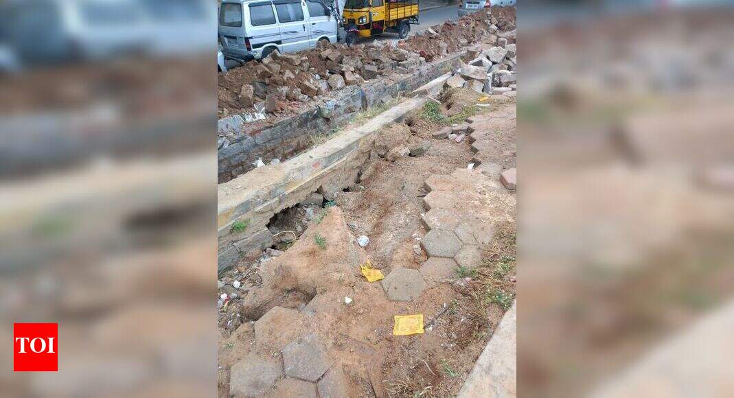 Compound wall of Ground collapsed - Times of India