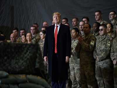 Donald Trump makes secret visit to Afghanistan, confirms talks resumption with Taliban