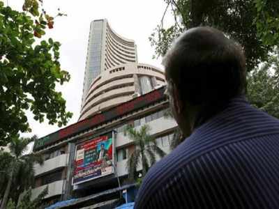 Markets end lower in a see-saw trade as RBI surprises with status quo