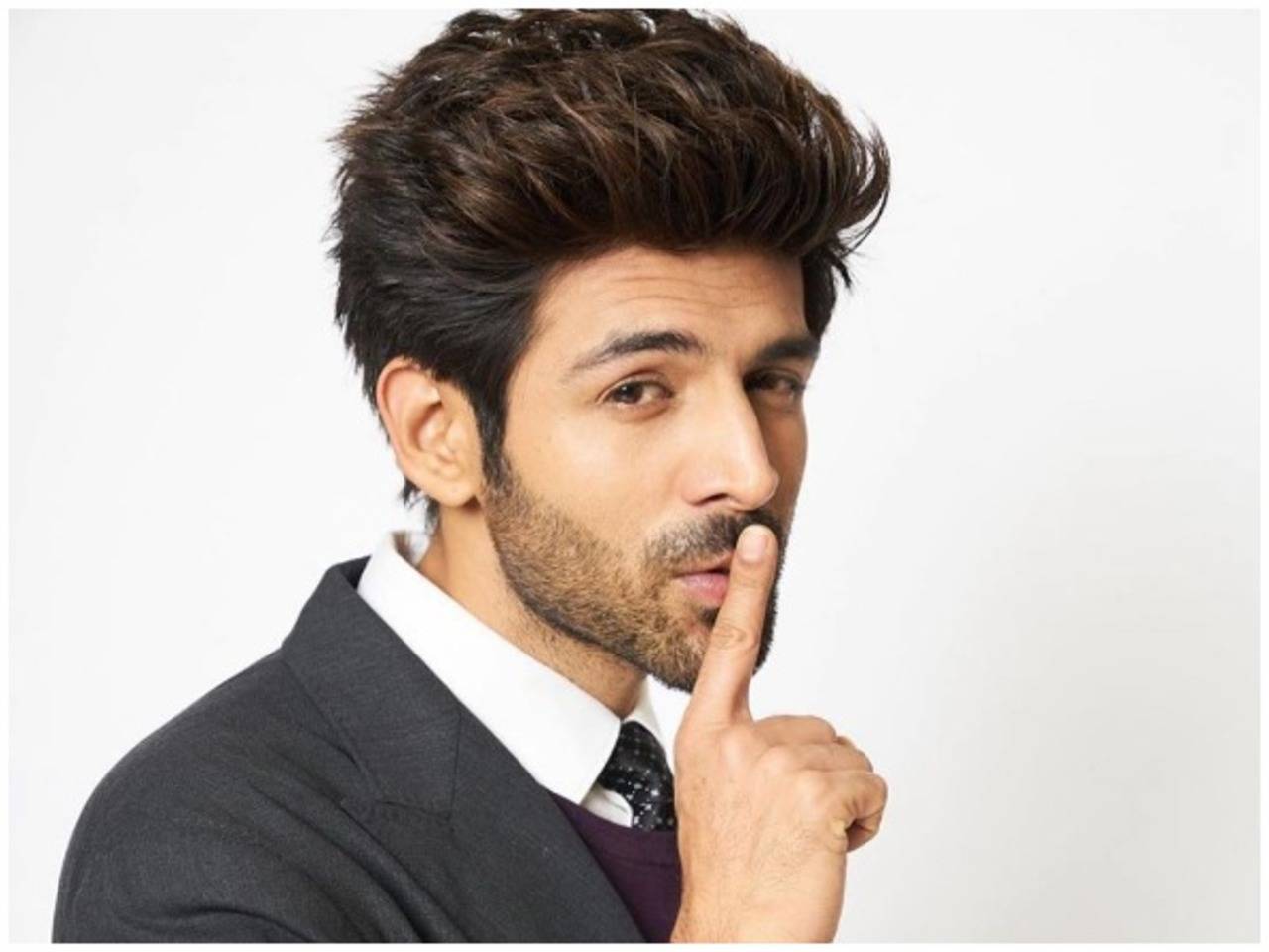 Kartik Aaryan gets his hair chopped and shares a quirky post that leaves  his fans curious  Filmfarecom