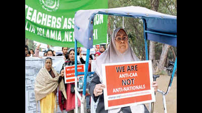 Jamia Millia Islamia teachers march on, thank supporters