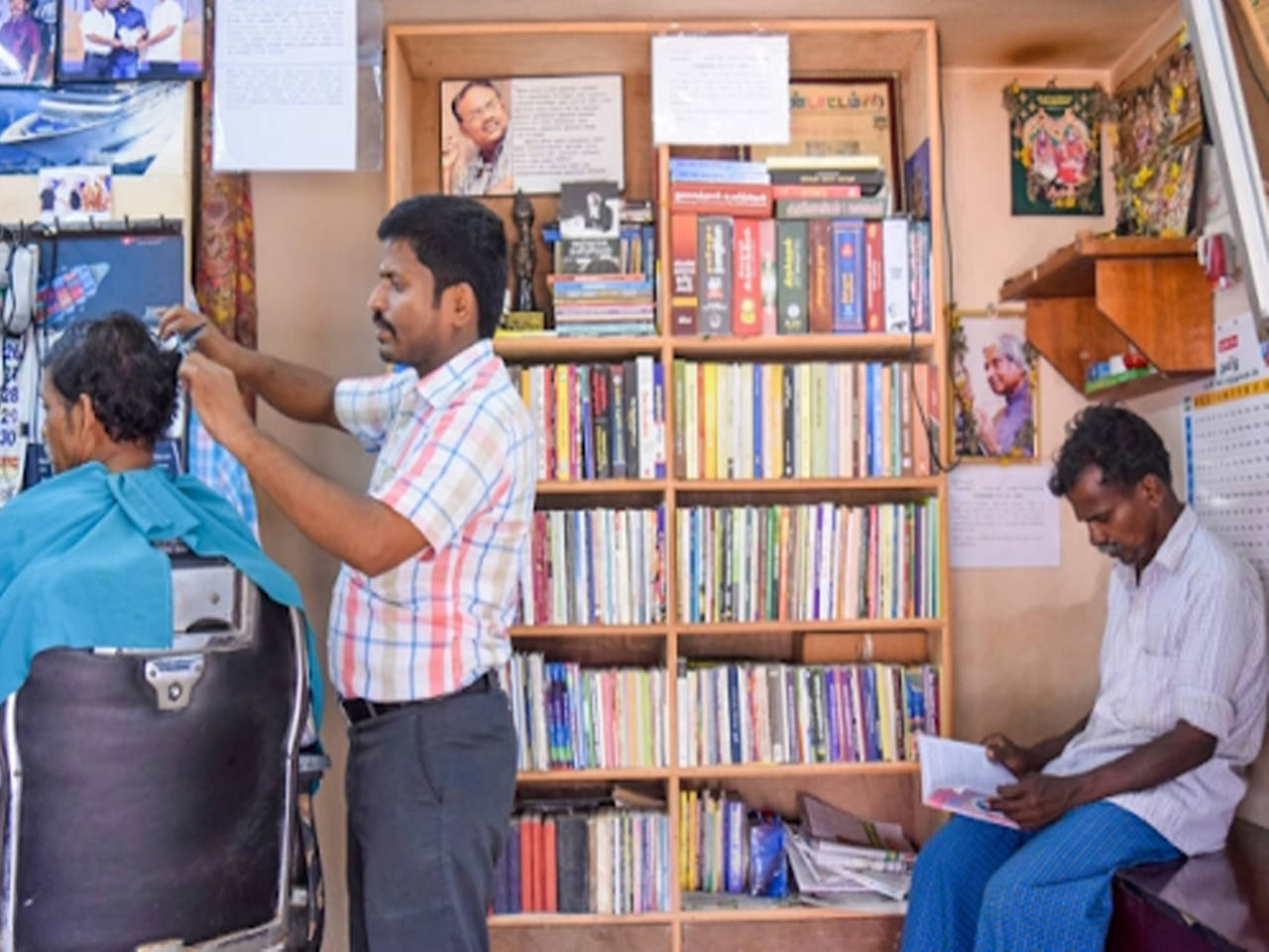 Photos: This Tamil Nadu hairdresser has a library in his salon | Madurai  News - Times of India
