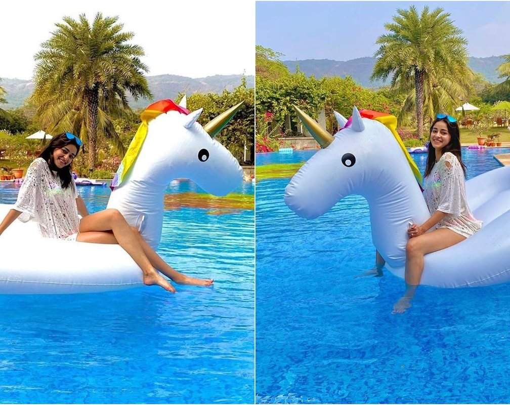 
Ananya Panday rides a unicorn float as she poses in swimming pool
