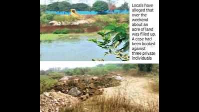 Greens see red as construction debris makes its way into Neknampur lake